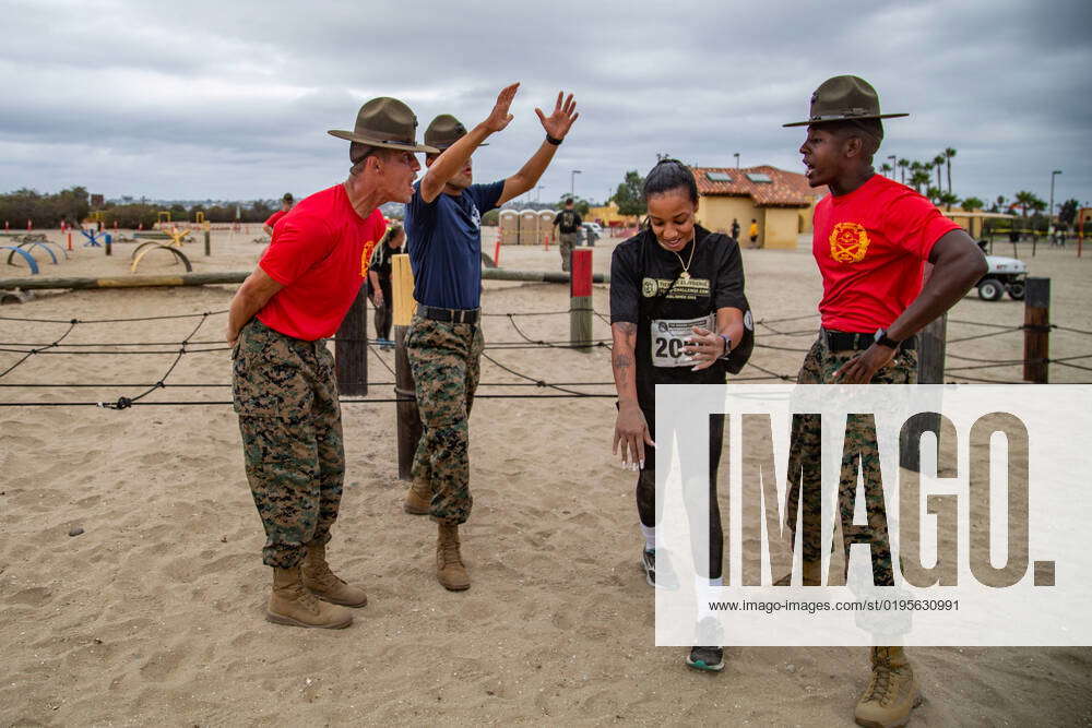 A Boot Camp Challenge participant runs at Marine Corps Recruit Depot ...