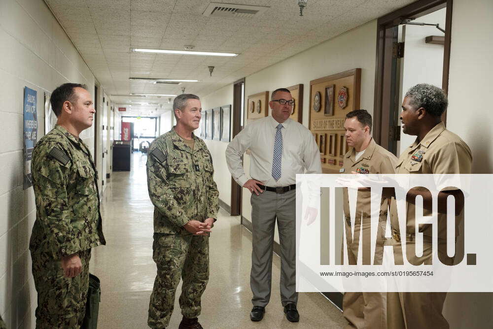 Rear Adm. Pete Garvin, center-left, commander, Naval Education and ...