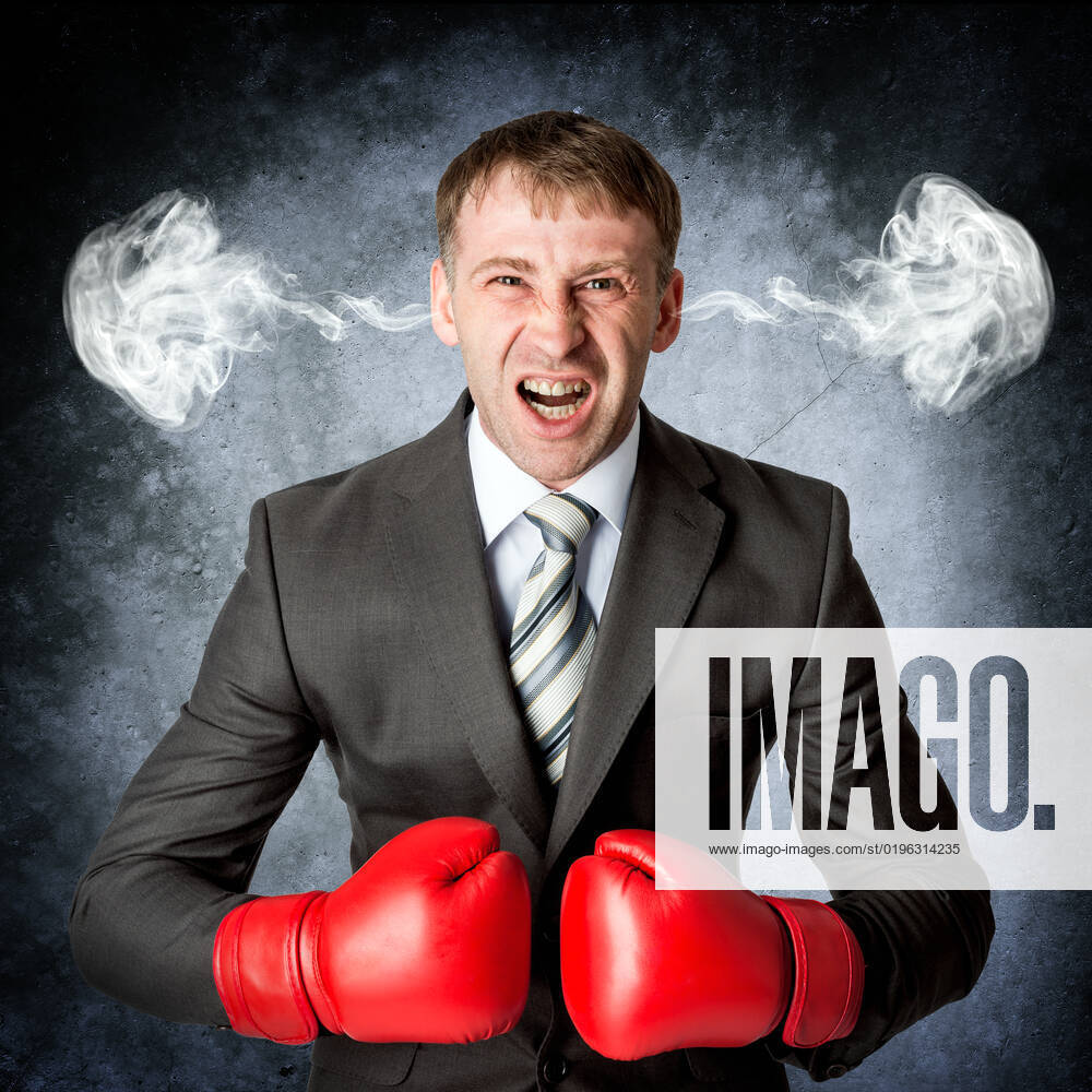 Business man to rage and smoke in head. Emotion concept, model released ...