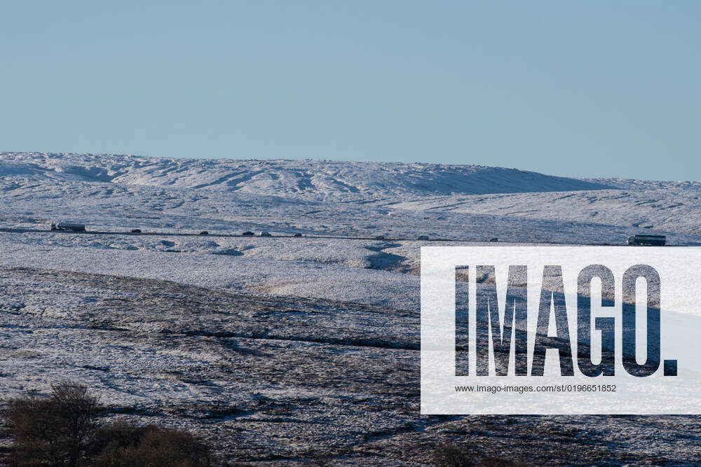 Traffic makes it s way through icy conditions along the A628