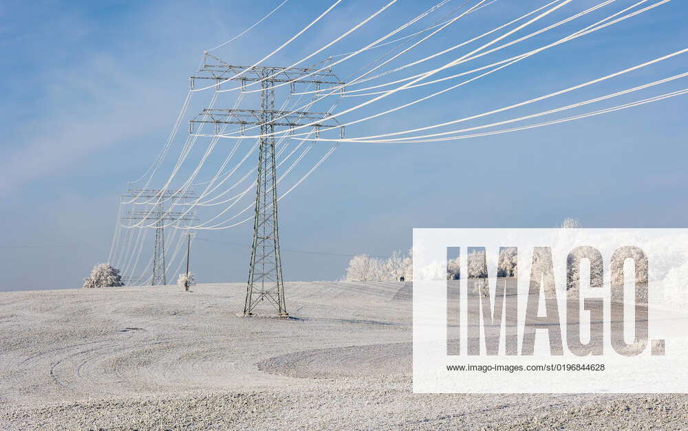 Iced power lines on a field near Magdeburg 18 12 2022, Magdeburg, GER