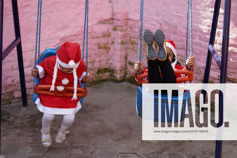 December 25, 2022, Kathmandu, NE, Nepal Children in a Santa Claus