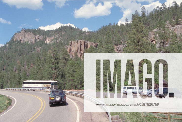 Jemez Mountain Trail - View of Battleship Rock Wayside. A bus and ...