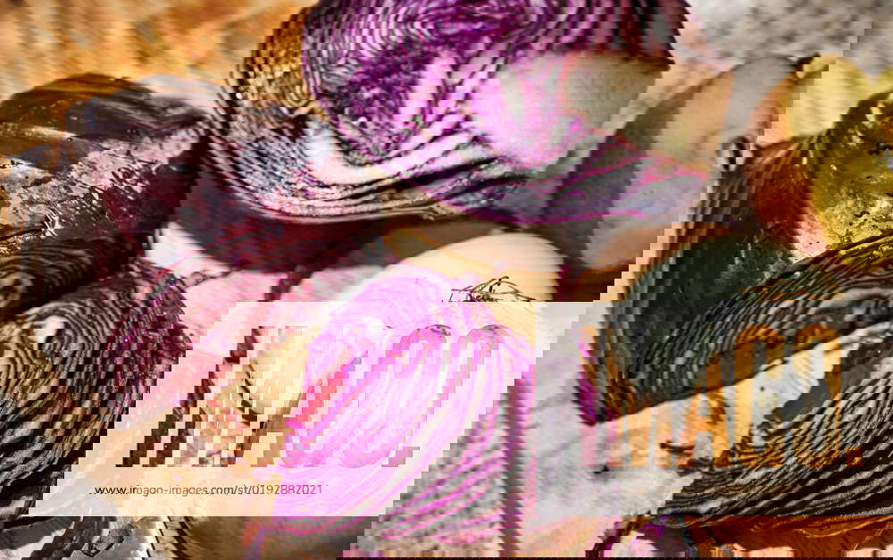 Household, kitchen, cooking, preparation, cutting vegetables, red cabbage, onion and apple on