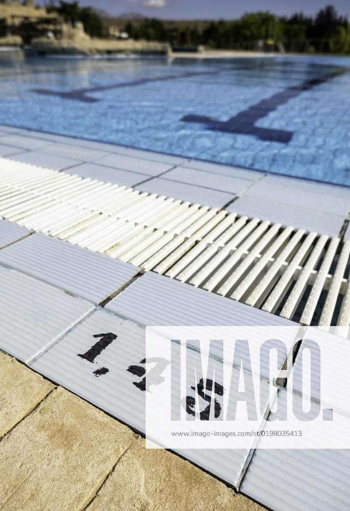 Numbers in a swimming pool, Detail of depth number in an outdoor
