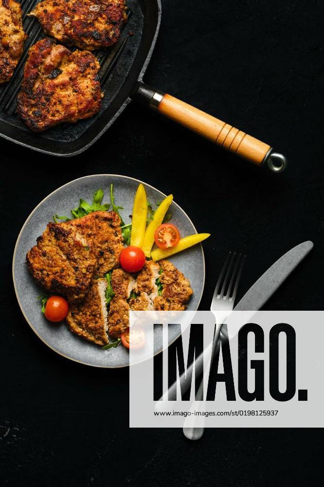 Pork fillet baked in oven with seasoning and herbs, Pork chop fillet