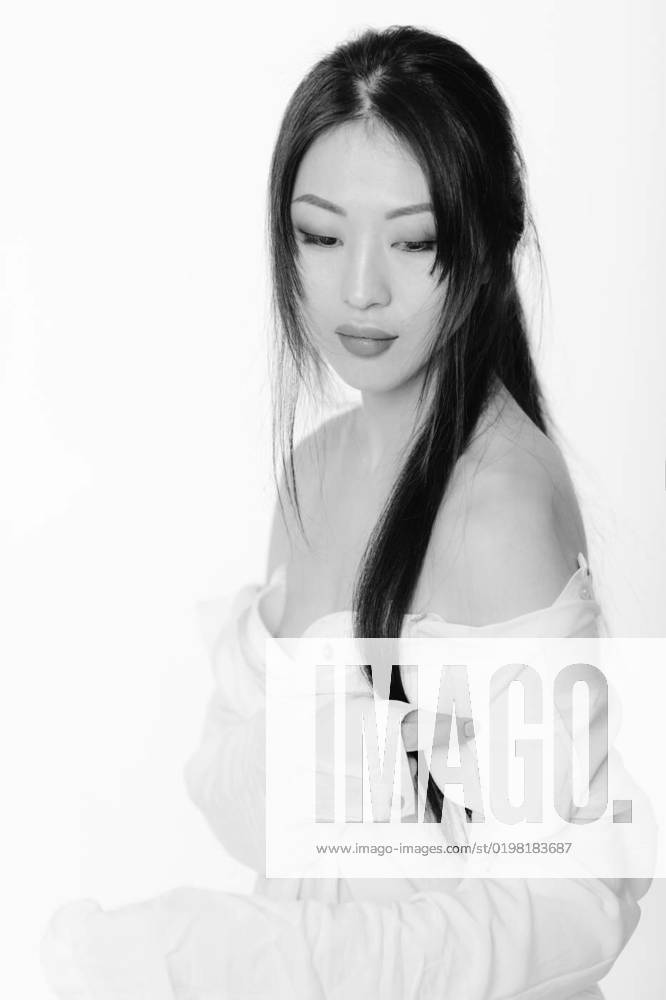Beautiful Asian Woman In White Shirt Posing In Studio Beautiful Sexy chinese-lady-stock-images-search-stock-images-on-everypixel