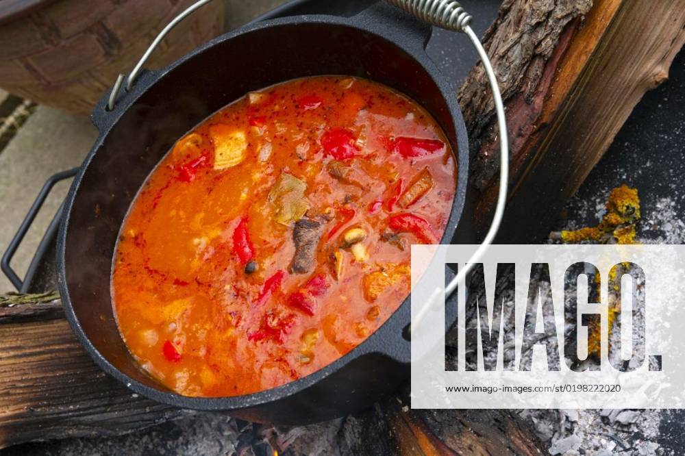 Kettle goulash is prepared over an open fire