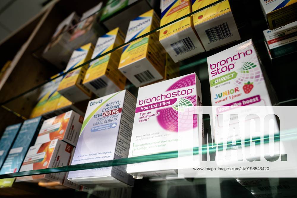 THE HAGUE Cough pastilles and cough syrup at a pharmacy The Netherlands