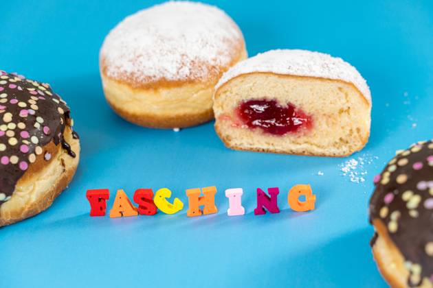 Bavaria, Germany - 12 January 2023: doughnuts with powdered sugar on a ...