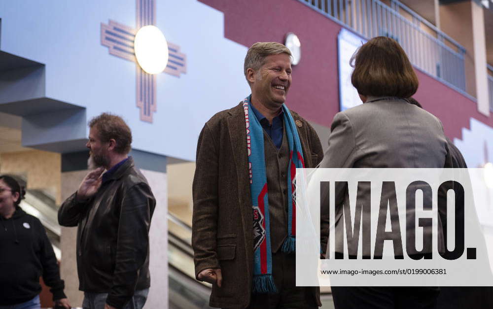 January 12, 2023, USA: Albuquerque Mayor Tim Keller, left, smiles after ...