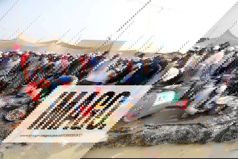 January 13, 2023, Dhaka, Dhaka, Bangladesh Muslim devotees cook food