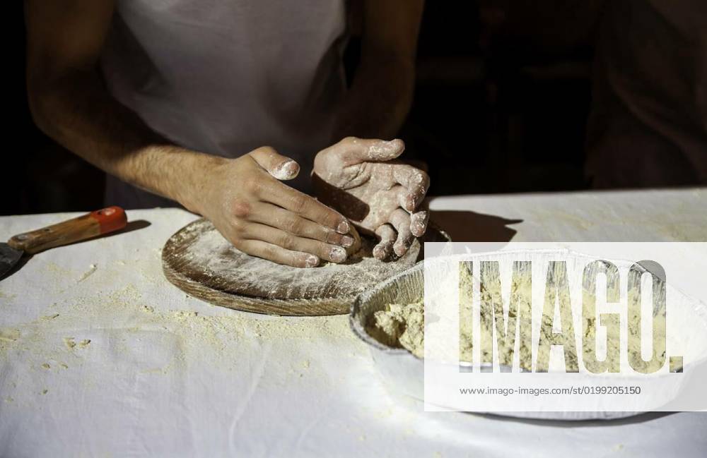 Kneading bread by hand, Detail of bread dough, traditional and artisan