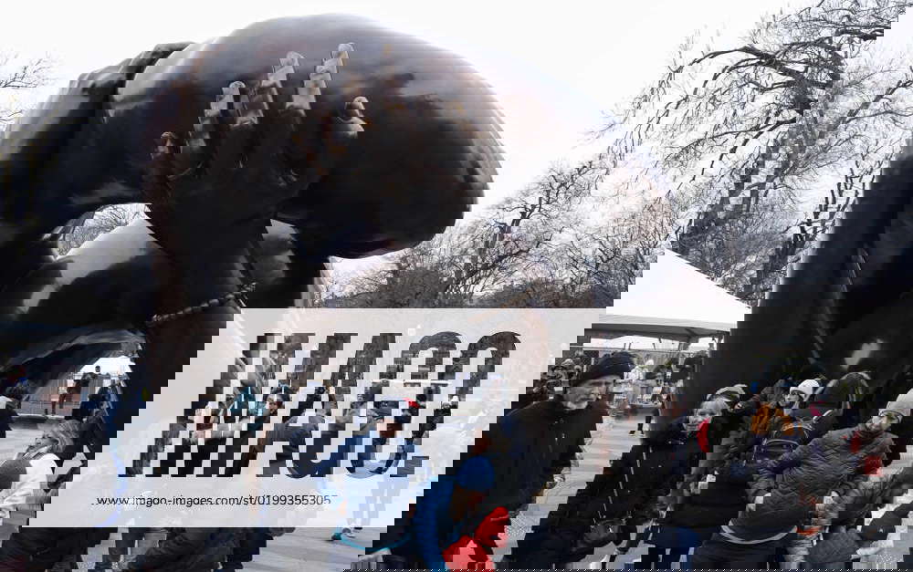 Martin Luther King Sculpture The Embrace In Boston MA People visit the