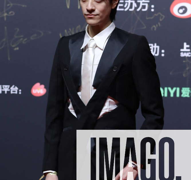 BEIJING, CHINA JANUARY 18 Singer Zheng Yunlong arrives at the red