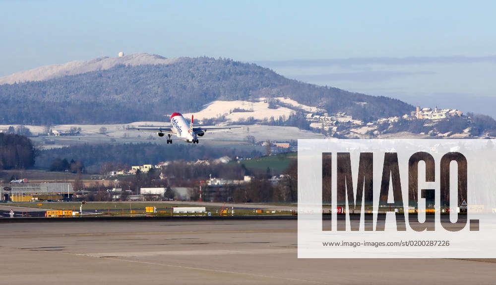 an-edelweiss-air-airbus-a320-with-the-registration-hb-ihz-taking-off