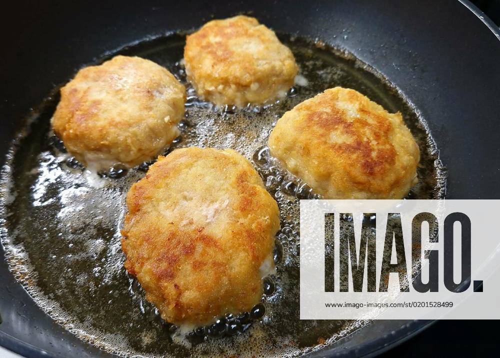Frying a minced meat steaks covered in crispy breadcrumb, Frying a pork