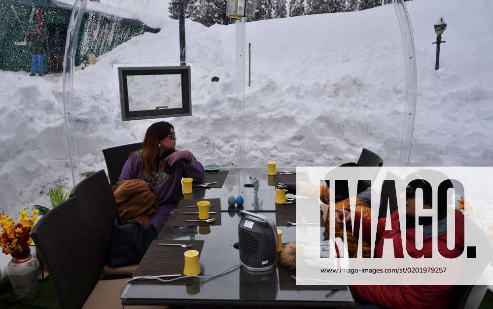 India First Glass Igloo restaurant in Gulmarg, Kashmir people enjoying