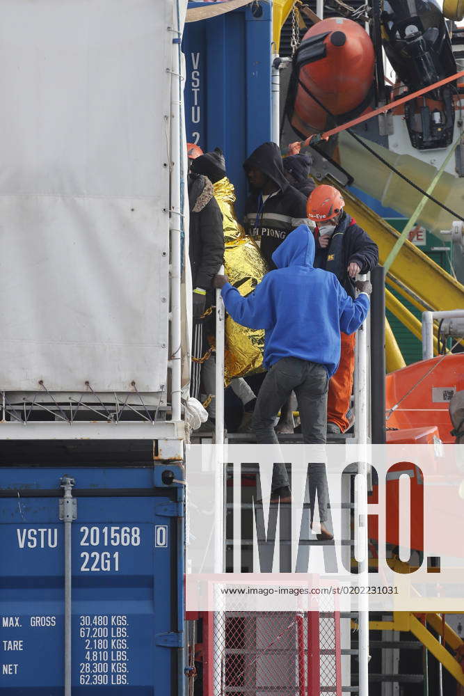 People Wait To Disembark The Rescue Ship Sea Eye 4 After It Docked With 106 Migrants On Board In