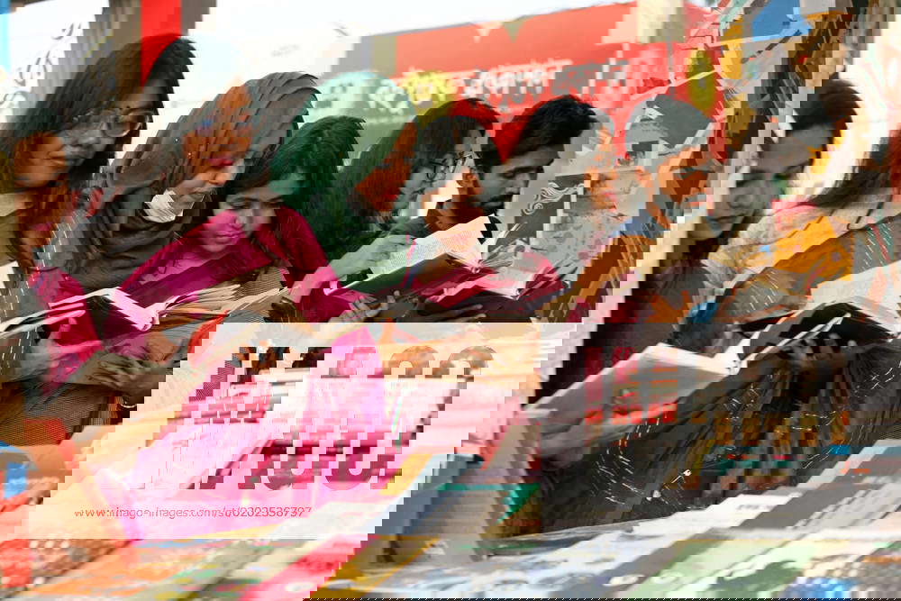 Book Fair In Dhaka February 09, 2023, Dhaka, Bangladesh Visitors read