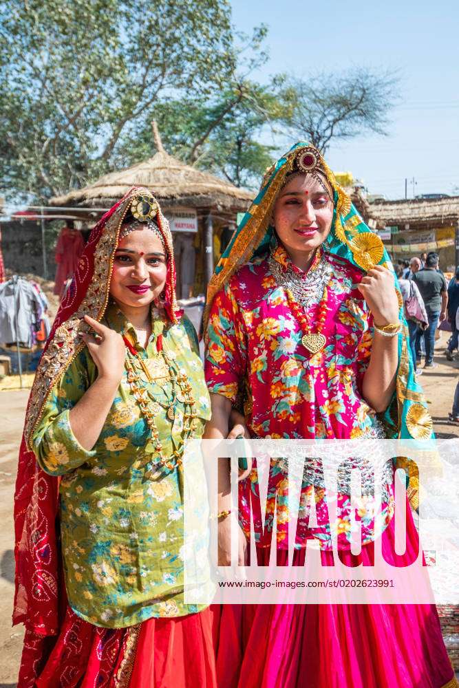 Noida Haat, India: Portrait on unidentified male artist performing folk  dance of haryana in colorful ethnic dress with smile and expressions Stock  Photo - Alamy