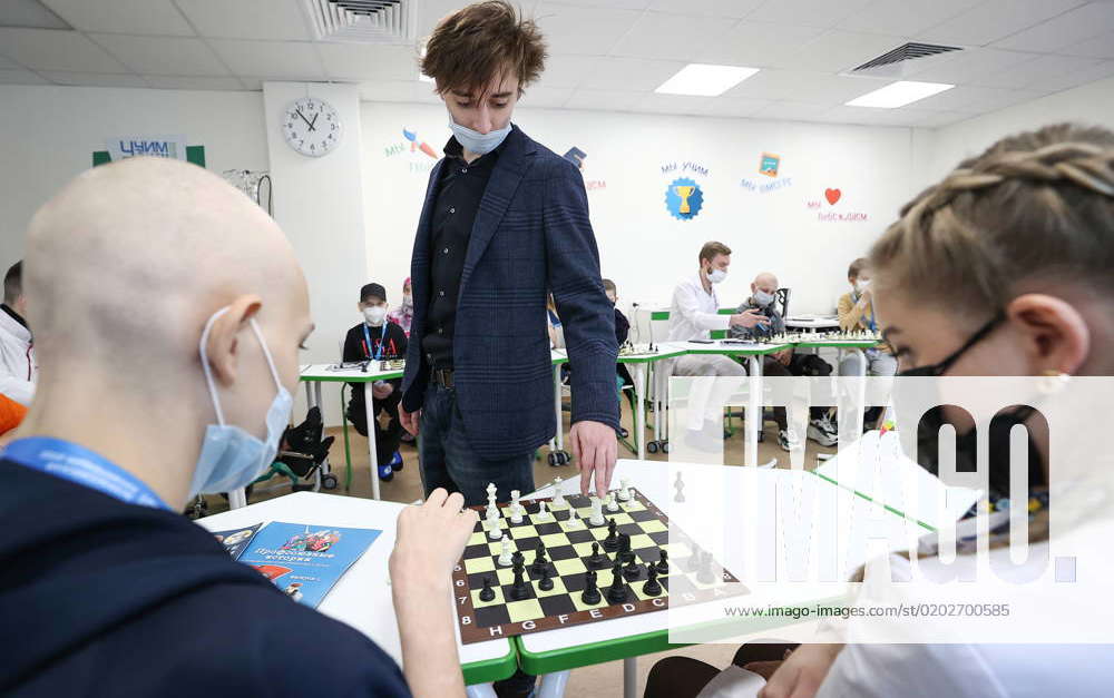 RUSSIA, MOSCOW - FEBRUARY 15, 2023: Russian chess grandmaster Daniil Dubov  (C) is seen during a