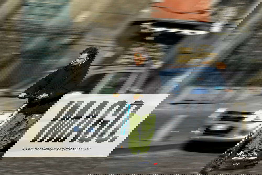 Italy electric scooters for hire A boy rides a rented batterypowered