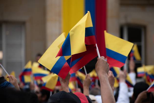 People gather with Colombian flags during a demonstration to support ...