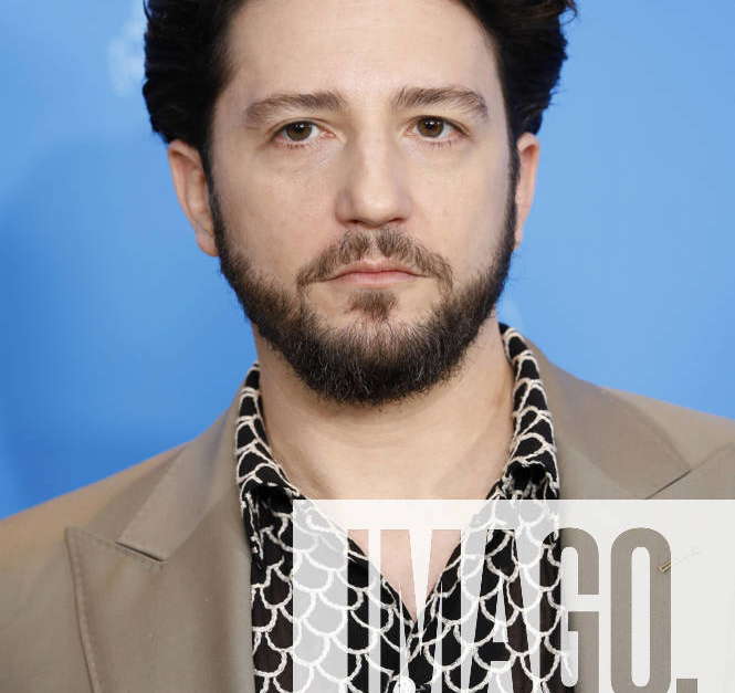 John Magaro at the photocall for the feature film Past Lives at the