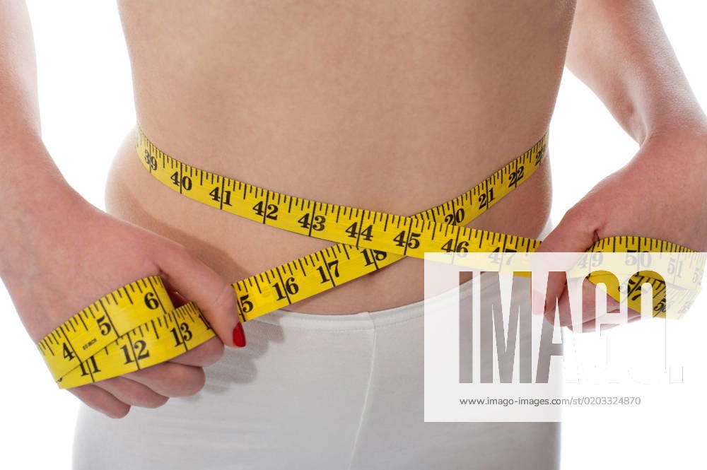 Woman Measuring Her Waist With A Yellow Measuring Tape, Isolated