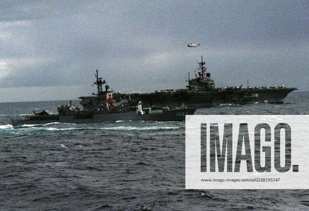 The US Navy (USN) Knox Class Frigate USS COOK (FF 1083) (foreground ...