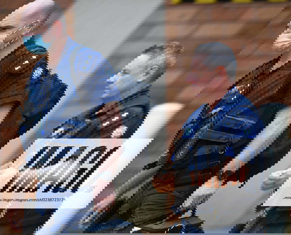 TONY MOKBEL GEELONG HOSPITAL, Armed security are seen at Geelong