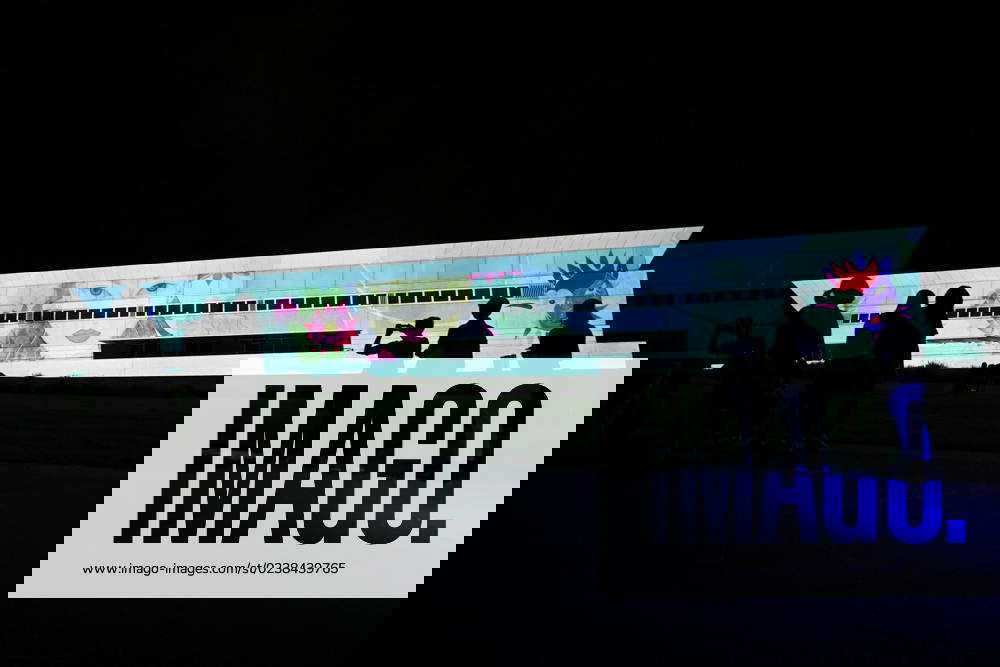 ENLIGHTEN FESTIVAL CANBERRA, Visitors take photographs of a light show