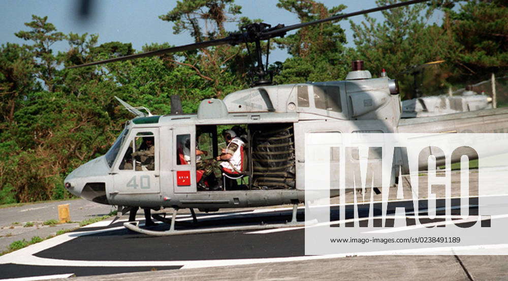 A UH-1 helicopter prepares to lift-off on a flight to Camp Kinser ...