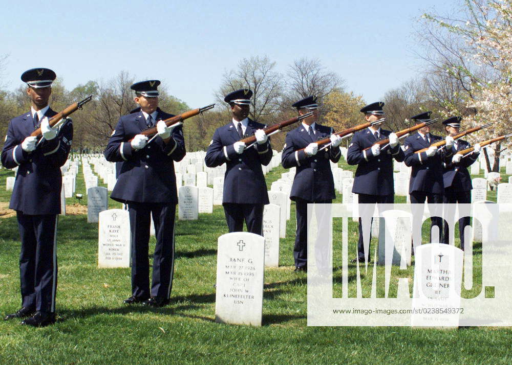 The US Air Force (USAF) Honor Guard fires a traditional 21 gun salute ...