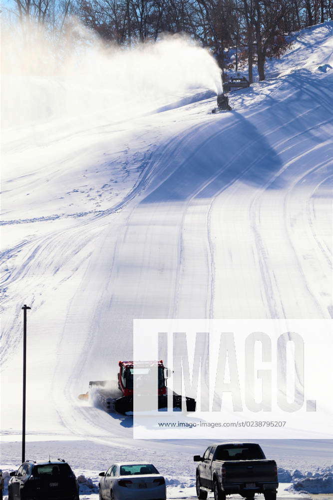 An employee operates a groomer on a hill Jan. 26, 2023, at Whitetail ...