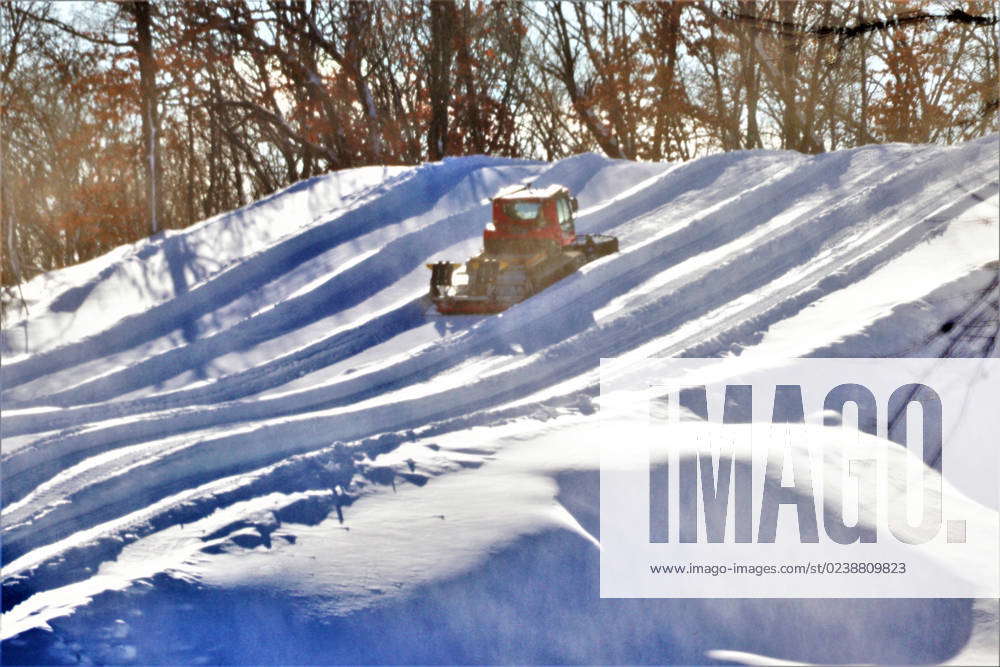 An employee operates a groomer on a hill Jan. 26, 2023, at Whitetail ...