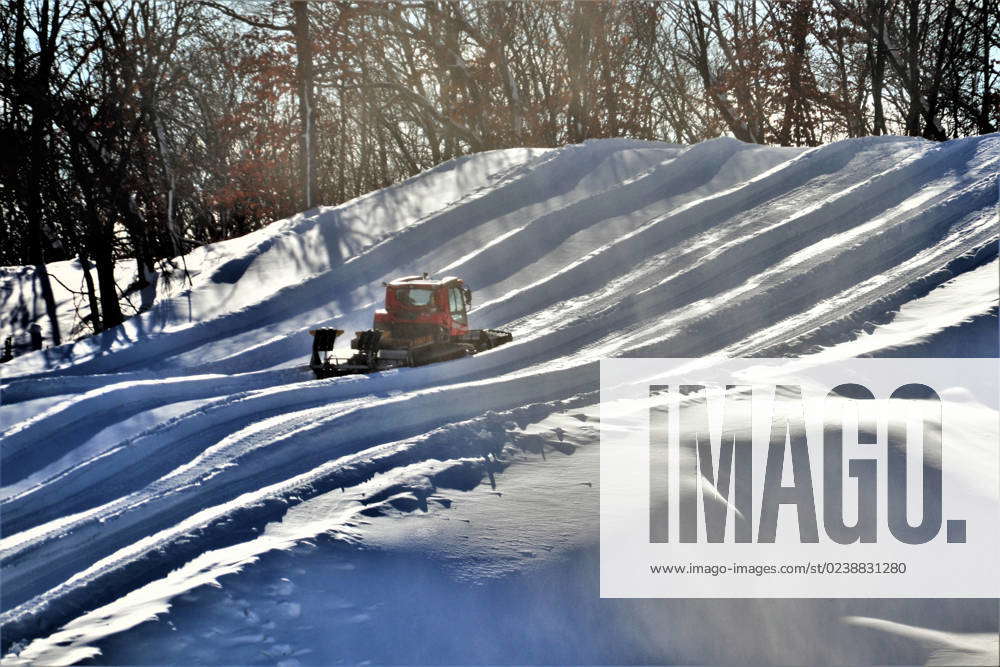 An employee operates a groomer on a hill Jan. 26, 2023, at Whitetail ...