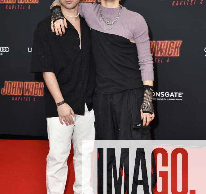 Alpay Santi and Theo Carow at the premiere of the motion picture John