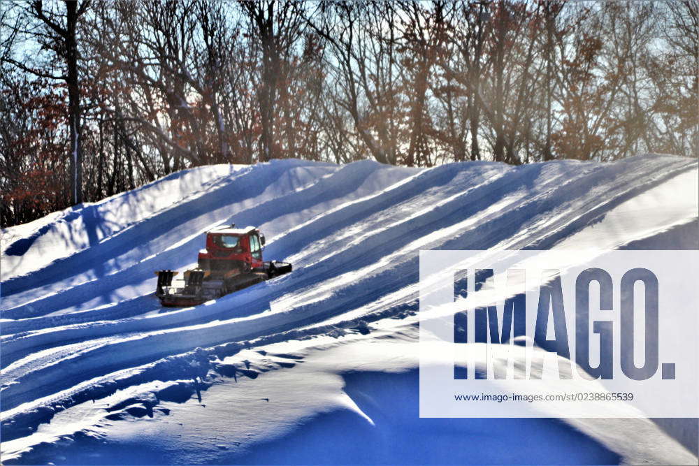 An employee operates a groomer on a hill Jan. 26, 2023, at Whitetail ...