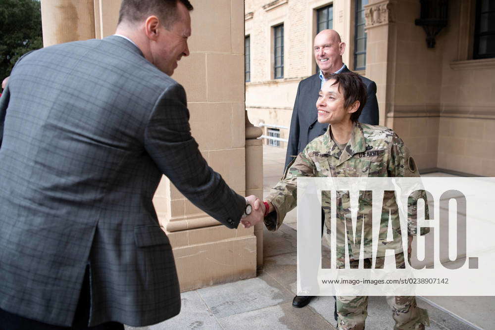 U.S. Army Col. Regina Pistone, U.S. Army South chief of staff, greets ...