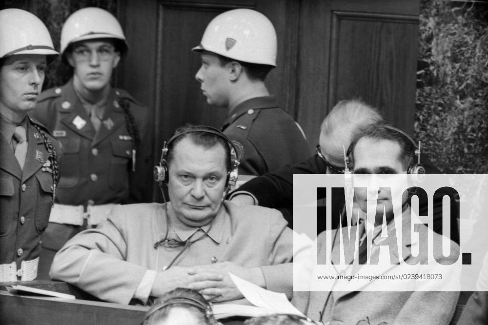 Nuremberg, Germany. Defendants Rudolf Hess and Hermann Goering (RL) sit in the prisoner s box in