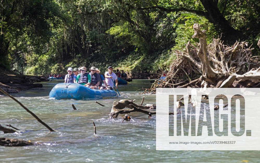 Muelle San Carlos, Costa Rica, Tourists at a picturesque Rafting Tour ...