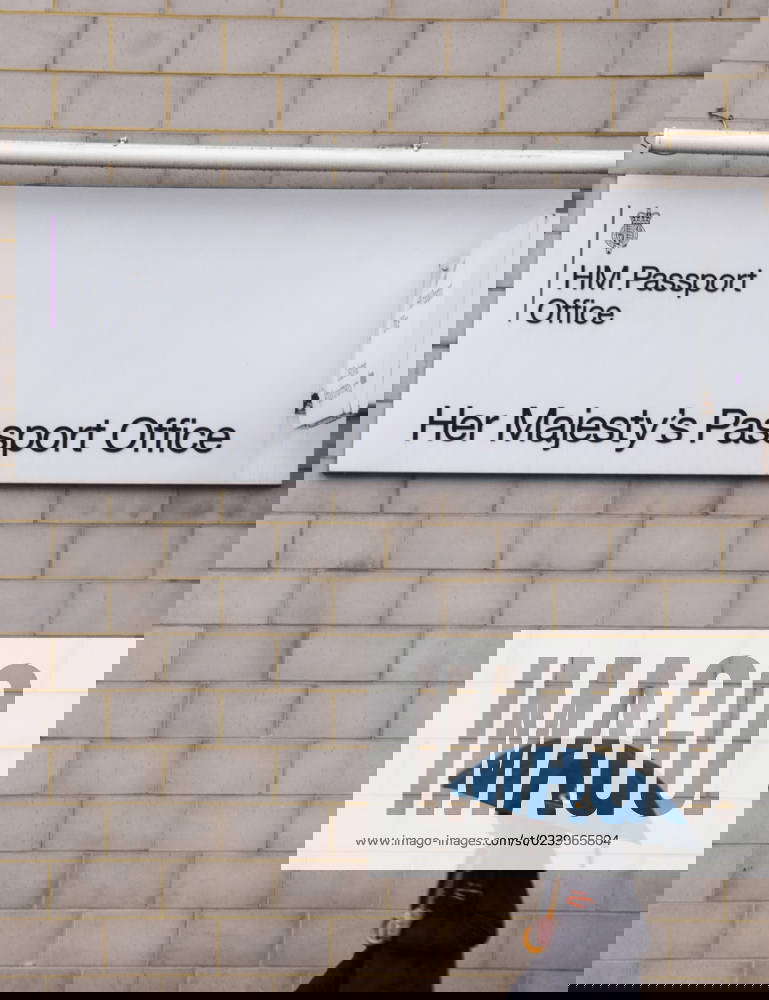 March 17, 2023, London, England, United Kingdom A man walks past the