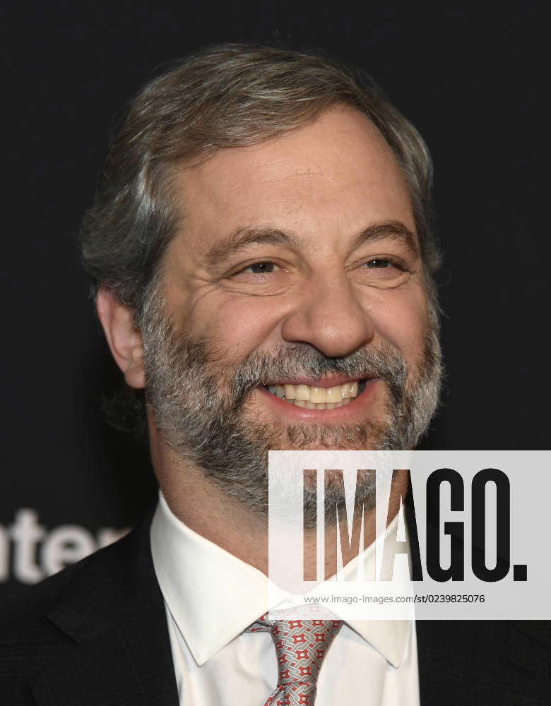 Filmmaker, comedian and actor Judd Apatow poses for photographers as he