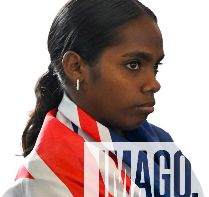 Jacinta Price Voice Presser An Indigenous Girl Wears An Australian Flag As She Listens To Country 7302