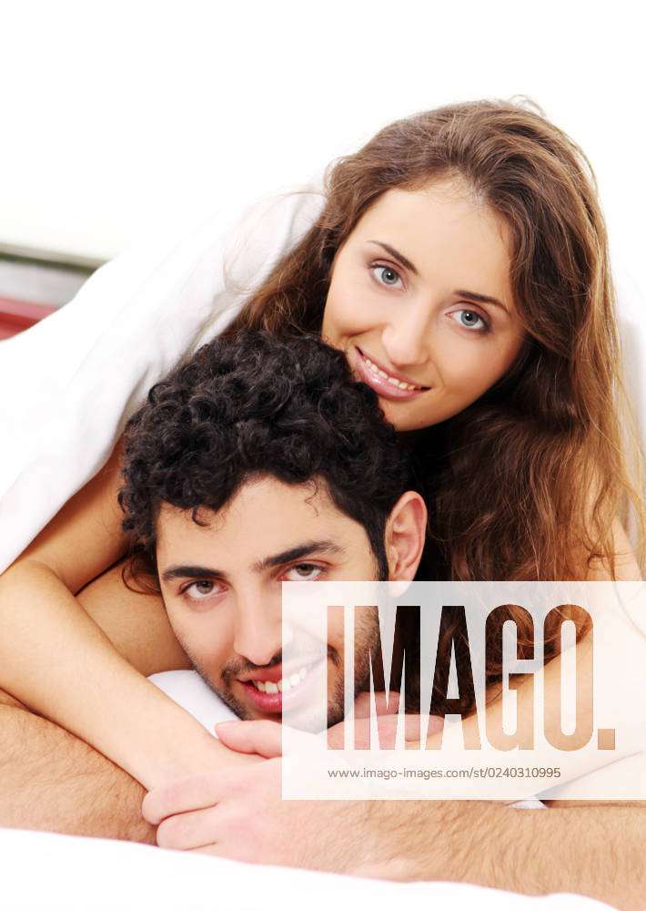 Young And Beautiful Couple In Bed 