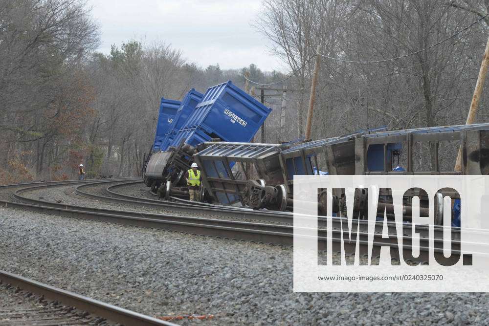 March 24, 2023, Ayer, Massachusetts, U.S Derailed train cars litter