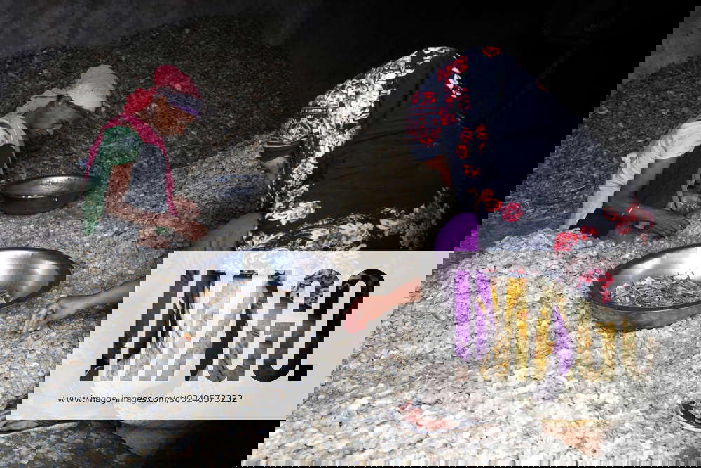 March 27, 2023, Dhaka, Dhaka, Bangladesh Workers are processing fish