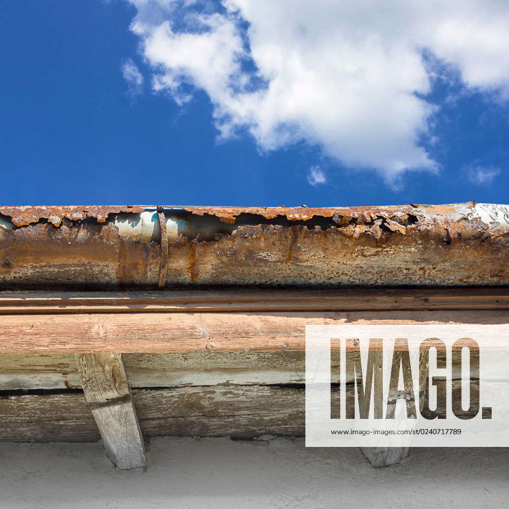 Broken gutter on the roof of a house , 31943844, abandoned, aged ...